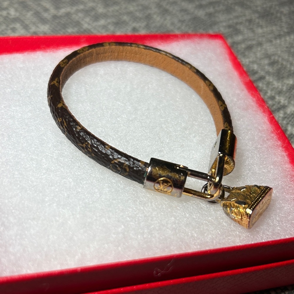 267. Louis Vuitton Monogram Alma Charm Bracelet with COA